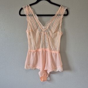 Sheer Lace V-Neck Romper Bodysuit in Light Peach. Auden. Medium. Tie Back